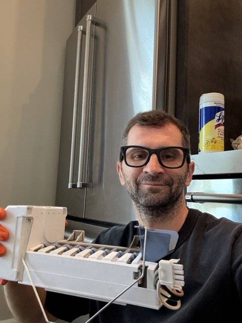 Ice maker module inspection during a Spark refrigerator repair in San Diego