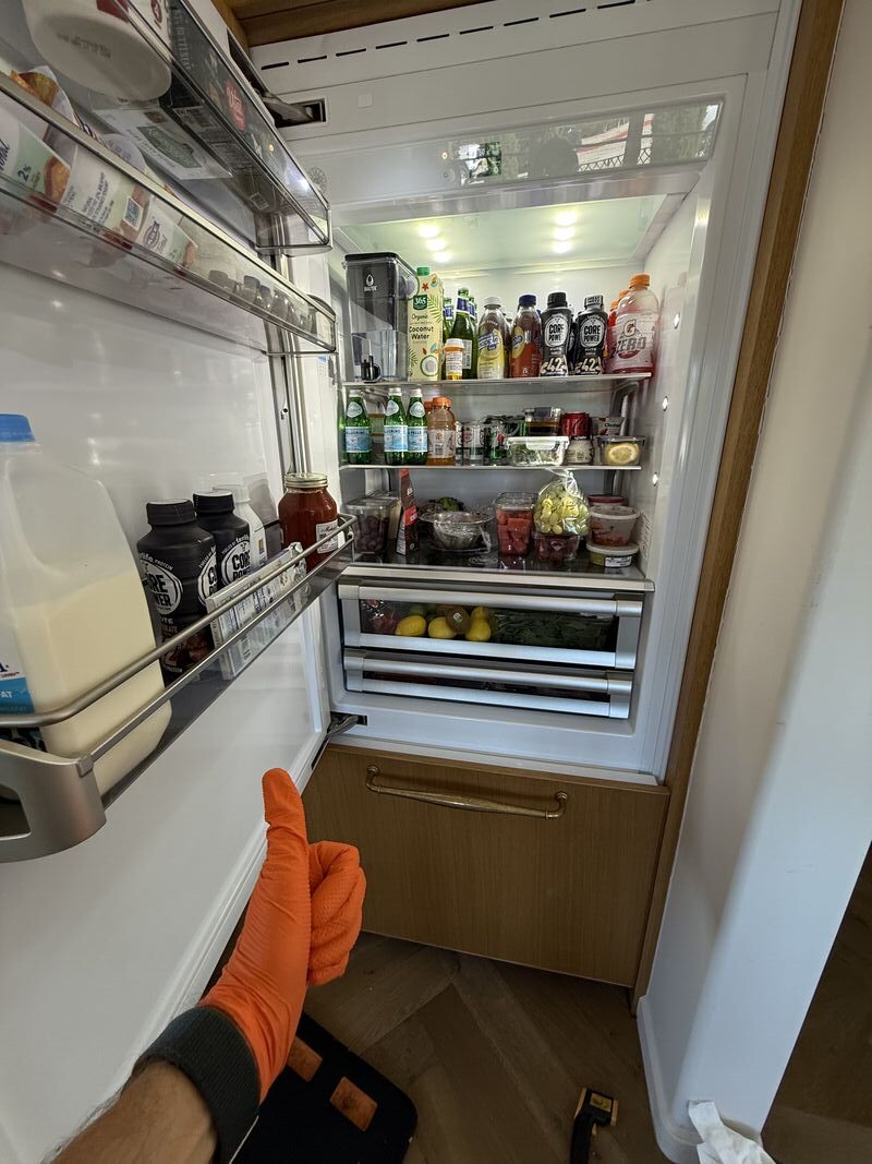 Sub-Zero column refrigerator open showing interior