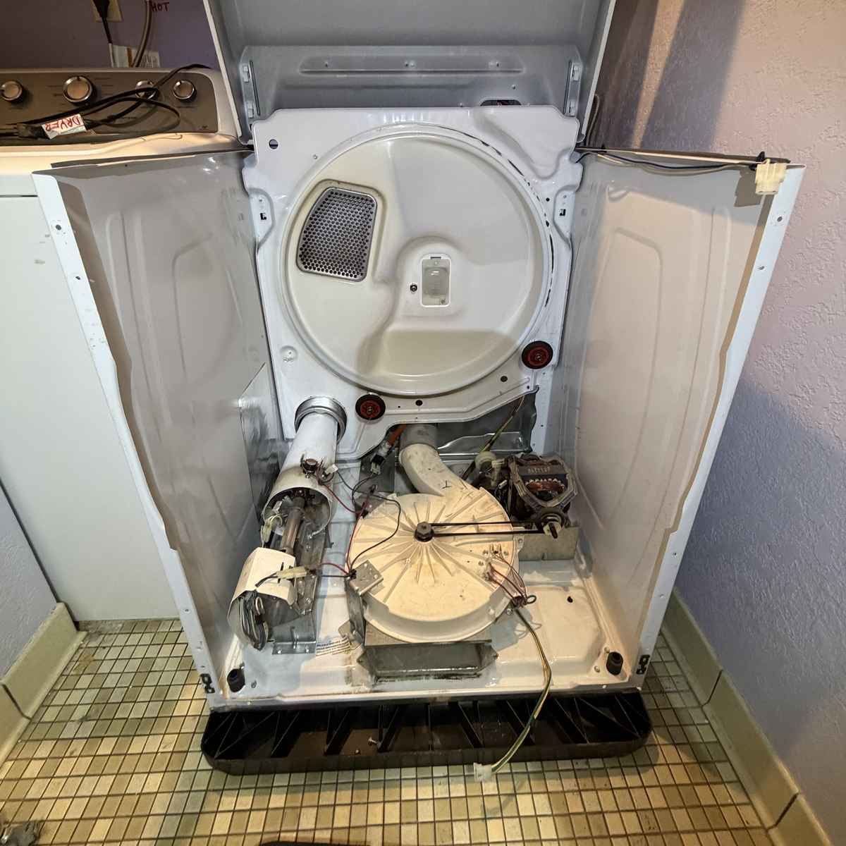 Dryer vent cleaning & lint trap service — Spark Appliance Repair San Diego