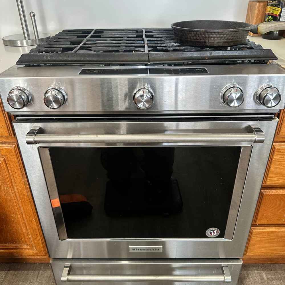 KitchenAid slide-in stainless gas range repair in a San Diego kitchen — Spark Appliance Repair